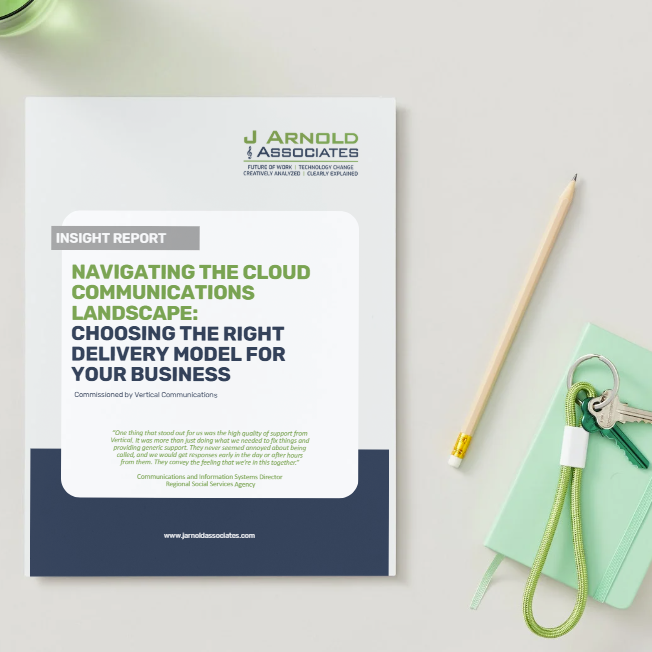 A document titled, "Navigating the Cloud Communications Landscape: Choosing the Right Delivery Model for Your Business Insight Report" sits on a table flat with a pencil and green notebook to the right.